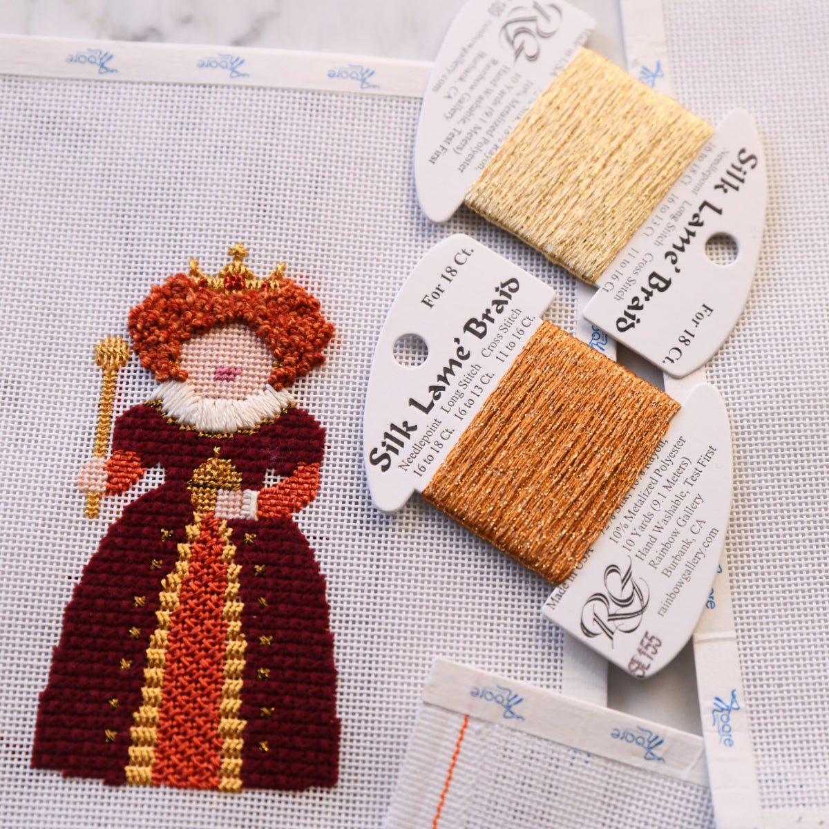 Photo of queen and threads for Moore Stitching