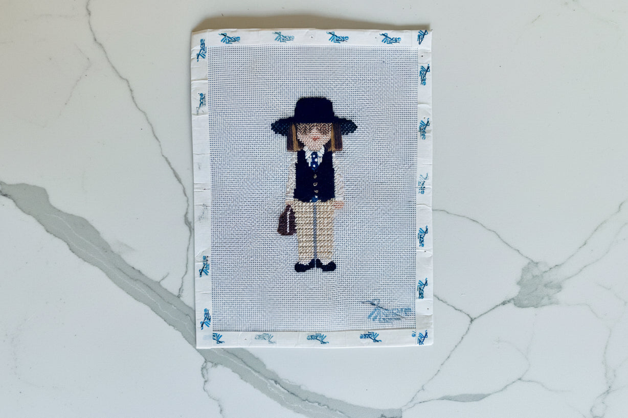 Cross-stitched portrait of a person in formal attire on a textured white background